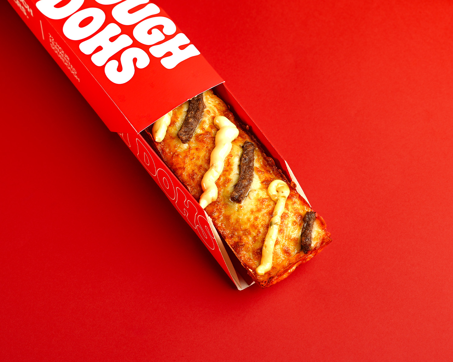 Dough Dohs Cheeseburger pizza in its branded red box
